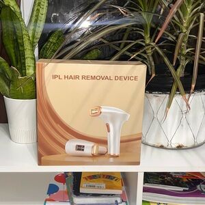 IPL Hair Removal Device with Gold Accents